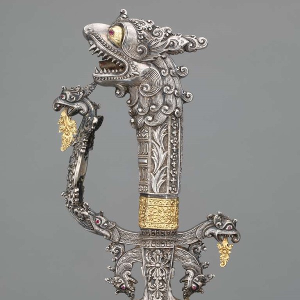 Silver Sinhalese sword with a handle resembling a naga or asura